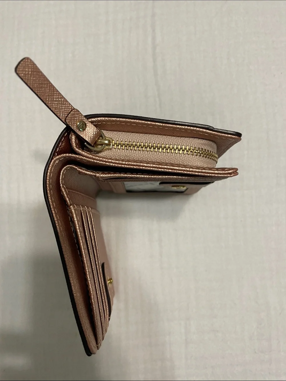 kate spade metallic rose gold compact cardholder